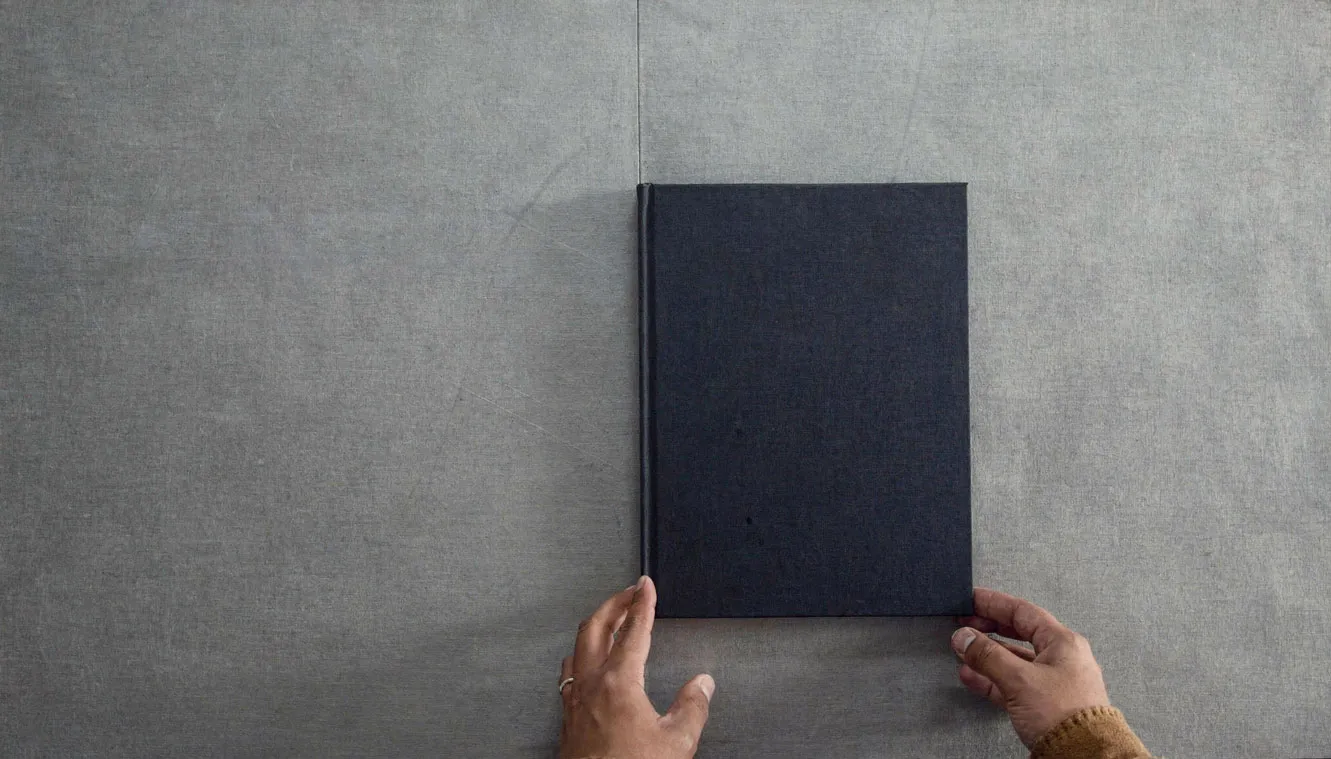 Hands setting a plain book in place to frame the first question of what funds are for.